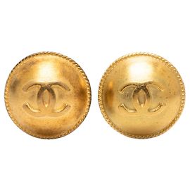 Orecchini a clip rotondi Chanel CC placcati oro