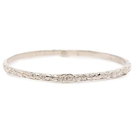 Bracciale rigido Chanel CC argentato placcato argento e strass costume