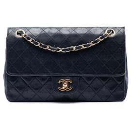 Borsa a tracolla Chanel Medium Classic Lambskin Double Flap nera
