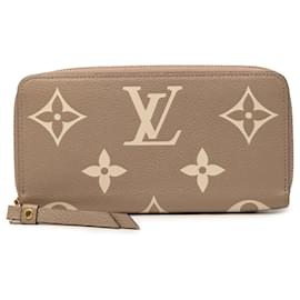 Cartera Zippy Giant Monogram Empreinte Bicolor Marrón Louis Vuitton