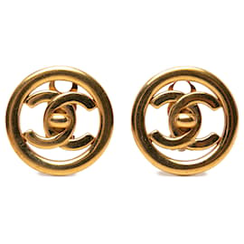 Orecchini a clip tondi Chanel CC placcati oro con chiusura Turn Lock