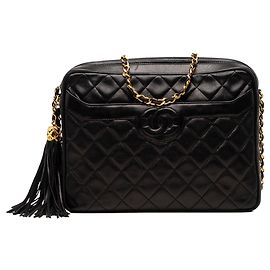 Borsa a tracolla Chanel Medium CC in agnello trapuntato nero con nappa