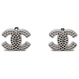 Orecchini a clip Chanel CC in ottone argentato traforati