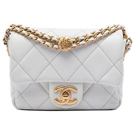 Sac bandoulière Chanel Mini Caviar matelassé blanc Twist Your Buttons Flap