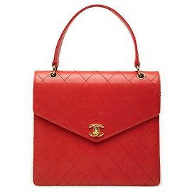 Bolsa de mão Chanel CC Quilted Caviar com alça superior e fecho Turnlock vermelha