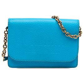 Borsa a tracolla con catena Hampshire in pelle martellata con logo in rilievo blu Burberry