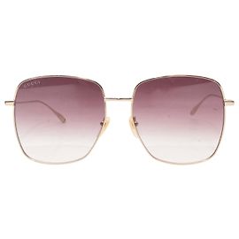 Gafas de sol Gucci Oversized con adornos de charms dorados