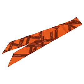 Sciarpa in seta Hermès Bolduc Twilly Arancione