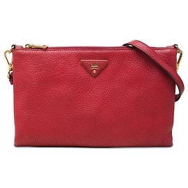 Bolso bandolera Prada Vitello Daino rojo