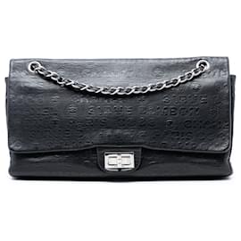 Borsa a tracolla Chanel Maxi Reissue 2.55 Double Flap in pelle di vitello goffrata nera