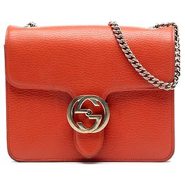 Piccola borsa a tracolla Gucci in pelle di vitello con doppia G intrecciata, arancione