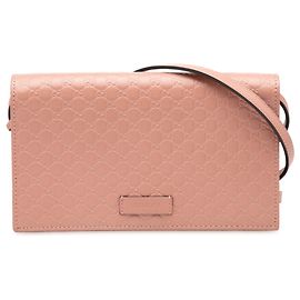 Borsa a tracolla Microguccissima rosa di Gucci