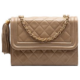 Borsa a tracolla Chanel in agnello trapuntato beige con nappa