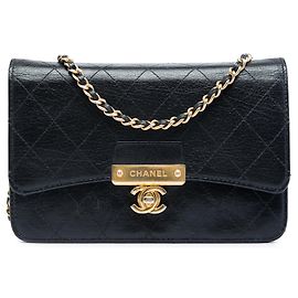 Borsa a tracolla con catena e portafoglio in pelle di capra trapuntata nera con CC dorato Chanel