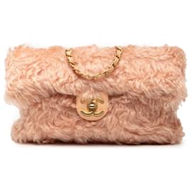 Clutch Chanel CC Fantasy in pelliccia rosa con catena