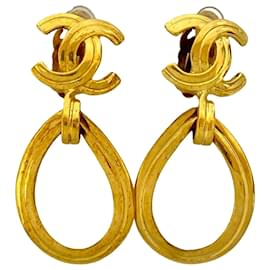 Orecchini a cerchio con clip Chanel CC placcati oro