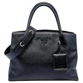 Borsa satchel monochrome in pelle Saffiano nera Prada
