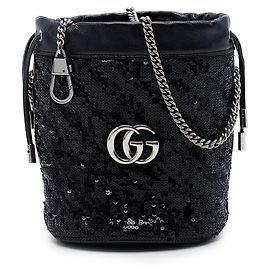 Borsa bucket Gucci Small GG Marmont in pelle di vitello matelassé con paillettes e diagonale nera