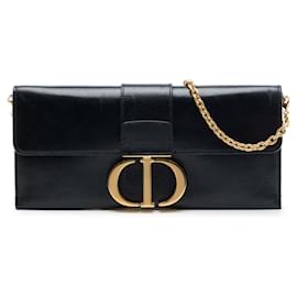 Clutch Montaigne 30 en cuero negro con bolso bandolera de cadena Dior
