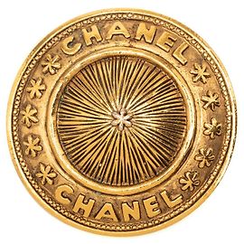 Spilla rotonda Chanel placcata oro