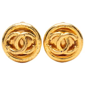 Orecchini a clip rotondi Chanel CC placcati oro