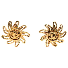 Orecchini a clip Chanel CC placcati oro sole