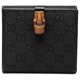 Cartera compacta de lona GG y cuero Bamboo negro Gucci