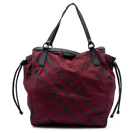 Tote in nylon Burberry con motivo Supernova Check rosso e fibbia