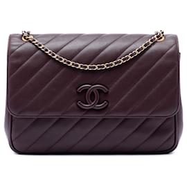 Borsa a tracolla Chanel in pelle di agnello trapuntata con firma CC rossa e motivo diagonale