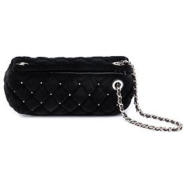 Clutch da polso Chanel in velluto trapuntato nero e diamanti