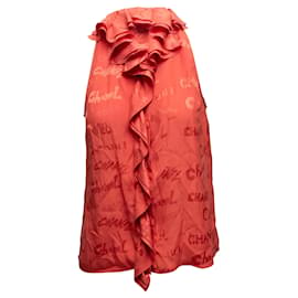 Top sin mangas con volantes y letras Chanel en seda naranja Talla FR 38