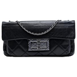 Sac à bandoulière Chanel en peau d'agneau matelassée noire Giant Mademoiselle Turnlock