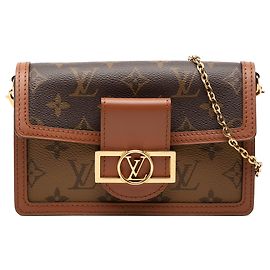 Portafoglio con catena Dauphine Monogram Reverse Louis Vuitton marrone a tracolla crossbody