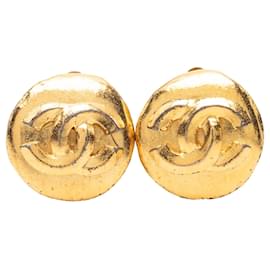 Orecchini a clip rotondi Chanel CC placcati oro