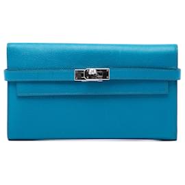Cartera larga trifold Kelly en piel Epsom azul Hermès