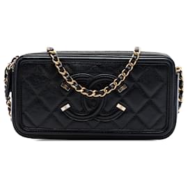 Clutch Chanel Caviar CC Filigree nera con borsa a tracolla con catena