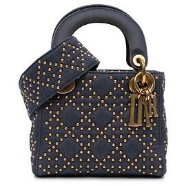 Borsa Lady Dior Supple in denim blu con borchie cannage Mini