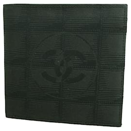Cartera Chanel New Travel en lona de nylon