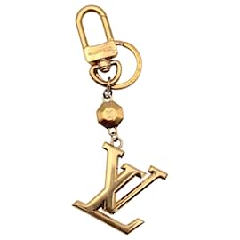 Louis Vuitton Portachiavi e Charm per borsa LV Facette in metallo dorato
