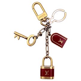 Louis Vuitton Portachiavi Cadenas in metallo oro e rosso