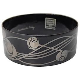 Bracciale rigido Michaela Frey in metallo ed email nero floreale
