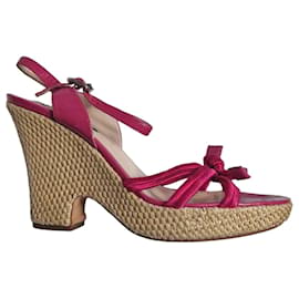Sandali con zeppa Céline rosa in pelle e paglia