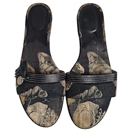 Givenchy Mules in pelle nera con stampa floreale e nappe