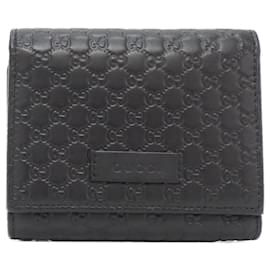 Gucci Tri-Fold Geldbörse aus schwarzem Micro GG Leder