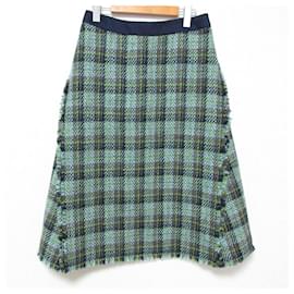 Autre Marque Falda de tweed a cuadros con flecos Drawer