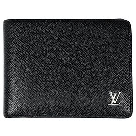 Portafoglio bi-fold Louis Vuitton in pelle Taiga