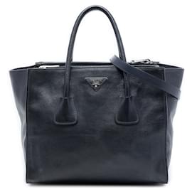 Bolso Prada de piel de becerro glaseada negra con doble asa y doble bolsillo