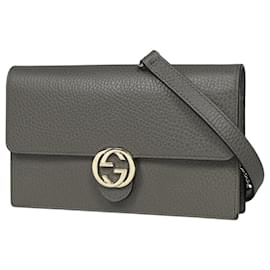 Portafoglio con catena Gucci Interlocking G