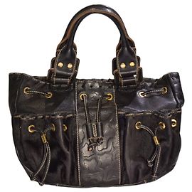 Autre Marque Borsa a tracolla TOUS in pelle nera goffrata con orso, coulisse e tasche multiple