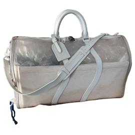 Louis Vuitton Bolso de viaje Keepall Bandoulière 55 en PVC transparente y piel blanca